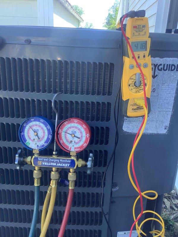 Responded to no cooling complaint and found evaporator coil freezing up. Performed diagnostic testing using manifold gauges and multimeter to assess system pressures and electrical parameters. Identified airflow restriction causing coil icing condition, likely due to restricted airflow across evaporator coil, and provided recommendations for resolving the freeze-up issue to restore proper cooling operation.
