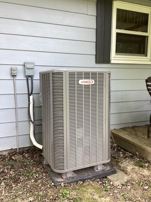Completed basic monthly cooling maintenance on Lennox residential air conditioning system. Performed standard inspection of outdoor condenser unit, verified proper operation of Honeywell Home ProSeries thermostat displaying 74°F in cooling mode, and confirmed system functionality. All components operating within normal parameters at time of service.