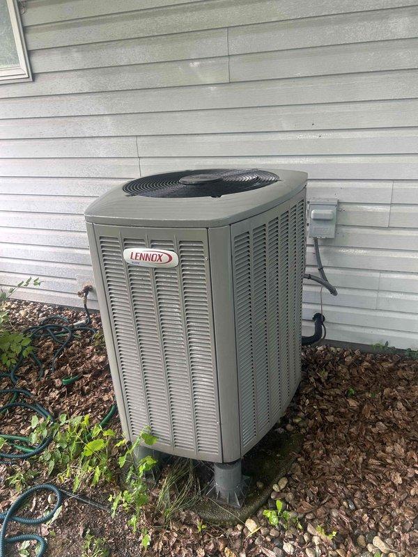 Completed complimentary maintenance tune-up on Lennox air conditioning system as part of new membership enrollment. Performed standard preventative maintenance inspection of outdoor condensing unit and verified Honeywell thermostat operation with system cooling properly and maintaining setpoint. Documented filter status as unknown per customer request and provided replacement filter recommendation.