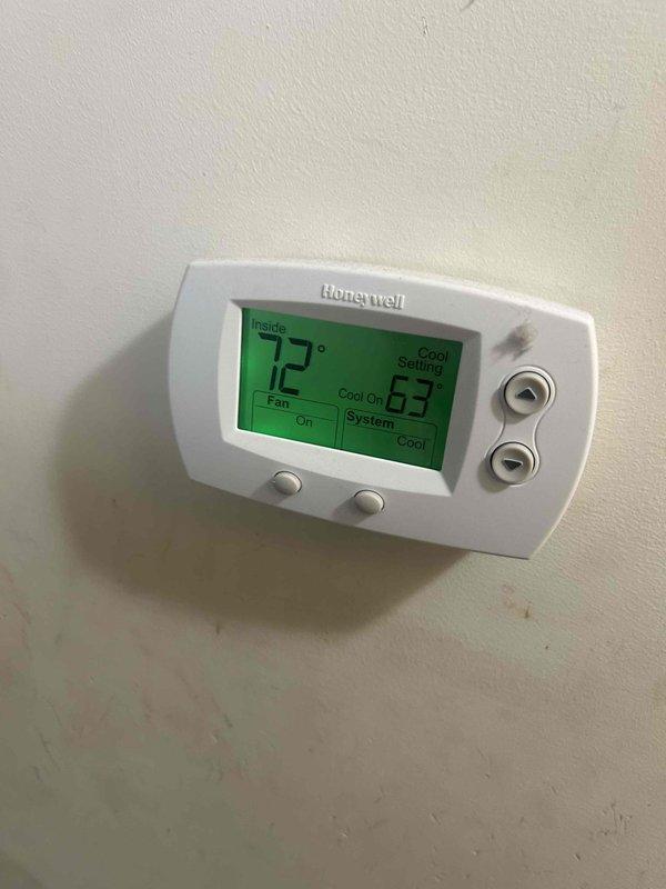 Completed complimentary maintenance tune-up on Lennox air conditioning system as part of new membership enrollment. Performed standard preventative maintenance inspection of outdoor condensing unit and verified Honeywell thermostat operation with system cooling properly and maintaining setpoint. Documented filter status as unknown per customer request and provided replacement filter recommendation.