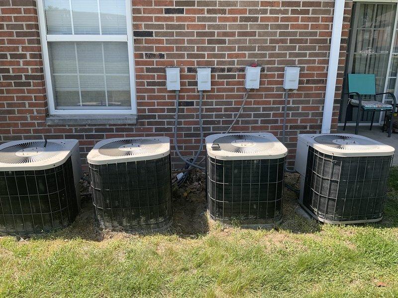 Responded to cooling system failure due to failed compressor at multi-unit residential property. Evaluated existing HVAC system configuration consisting of multiple outdoor condenser units serving the building. Documented current equipment condition and installation setup, including indoor air handler components and refrigerant line routing. Provided comprehensive replacement estimate for complete system upgrade with expedited timeline as requested by property management.