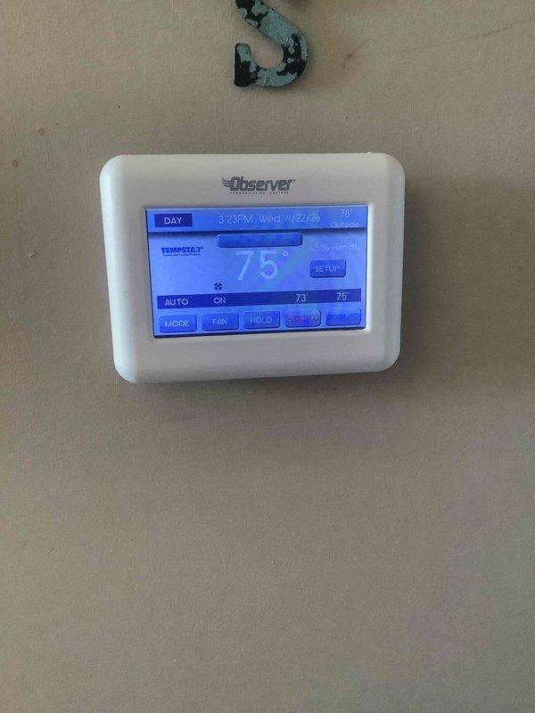 Completed basic monthly cooling maintenance on residential HVAC system. Inspected outdoor condenser unit, verified proper operation of all components, and checked refrigerant lines and electrical connections. Confirmed thermostat functionality and system controls operating correctly at 75° setpoint in AUTO mode.