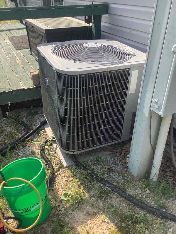 Completed basic monthly cooling maintenance on residential HVAC system. Performed standard inspection of outdoor condenser unit, verified proper operation of ecobee thermostat displaying 70°F setpoint with 55% humidity reading in hold mode, and confirmed system functionality. All equipment operating within normal parameters at time of service.