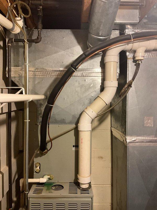 Conducted comfort consultation and system evaluation for full HVAC replacement estimate. Assessed existing 1993 furnace and 1997 air conditioning unit, both operating on R-22 refrigerant. System found to be low on refrigerant with multiple component failures identified including capacitors, contactors, and electrical issues requiring repair. Due to advanced age of equipment and cumulative repair costs needed to restore full functionality, recommended complete system replacement. Documented existing basement furnace installation and outdoor condensing unit with photographs. Provided replacement options for immediate upgrade timeline.