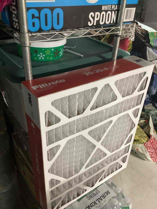 Completed comprehensive cooling season tune-up on residential outdoor condensing unit. Performed standard maintenance protocol including inspection of condenser coils, verification of refrigerant levels, electrical connections check, and airflow assessment. Verified indoor air filtration system with 20x25x4 pleated media filter accessible in storage area for future replacement.