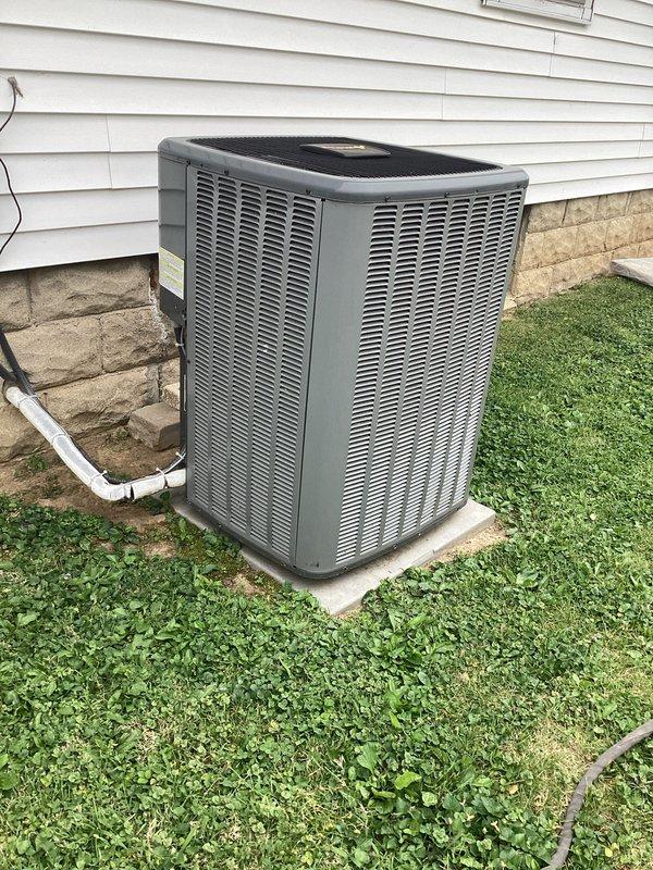 Completed comprehensive cooling season tune-up on residential outdoor condensing unit. Performed standard maintenance protocol including inspection of condenser coils, verification of refrigerant levels, electrical connections check, and airflow assessment. Verified indoor air filtration system with 20x25x4 pleated media filter accessible in storage area for future replacement.