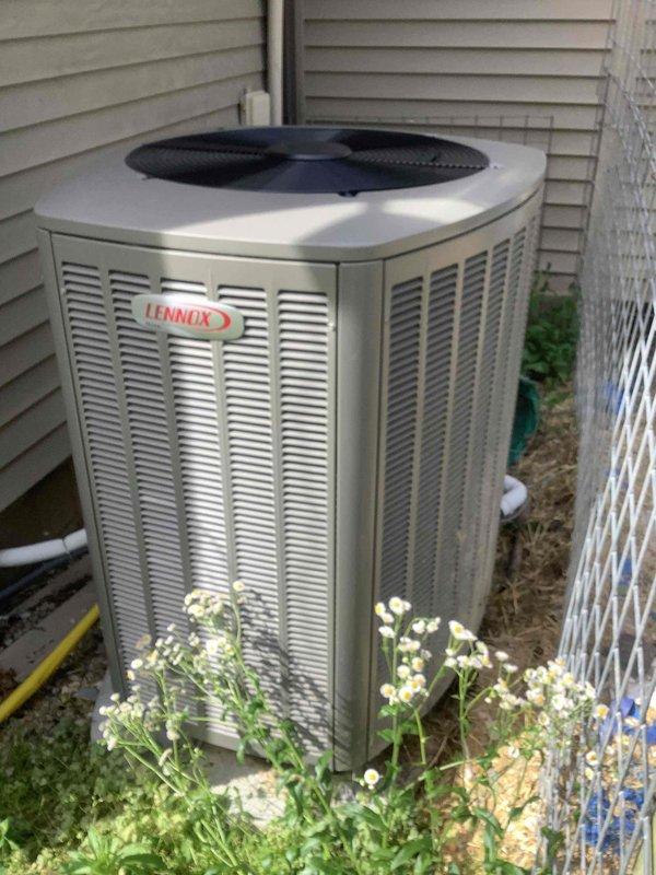 Completed scheduled cooling system maintenance on Lennox split system with outdoor condensing unit and indoor air handler. Performed comprehensive tune-up including visual inspection of both indoor and outdoor components, electrical testing with multimeter to verify proper voltage and amperage, checked refrigerant pressures and system operation. Inspected condensate drain line routing and verified proper drainage. All components operating within manufacturer specifications, system running efficiently with no issues identified.