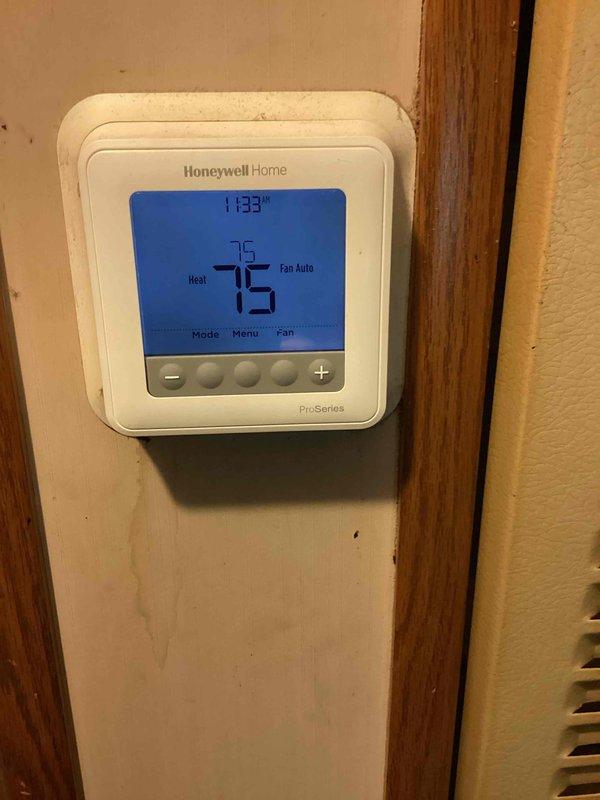 Completed monthly CCHP cooling maintenance service, which included replacing the 16x20x1 air filter with new unit. Verified thermostat operation showing system in heating mode at 76 degrees with fan set to auto, confirmed proper digital display function and control responsiveness. Inspected air handler unit, documented filter installation, and ensured all components were operating within normal parameters.