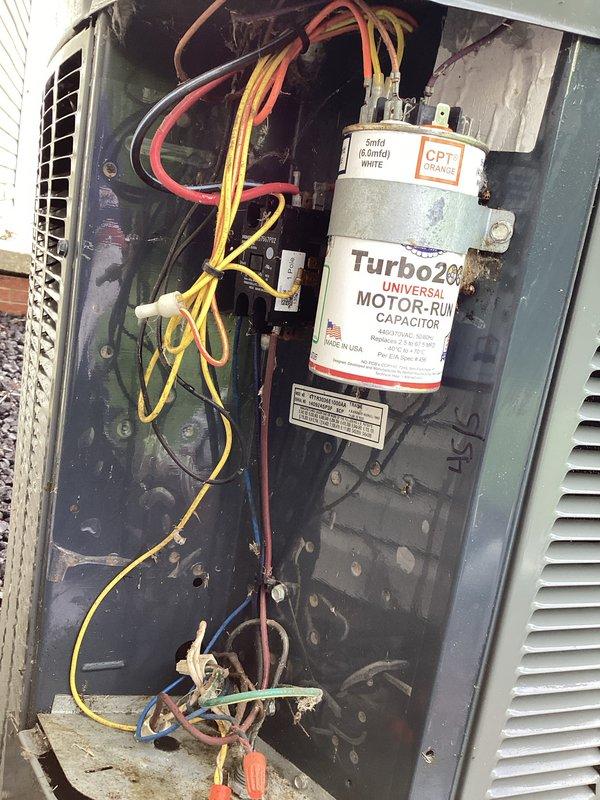 Completed basic monthly cooling system maintenance on residential AC unit. Performed standard inspection of outdoor condenser unit, verified electrical connections and components including Turbo200 universal motor-run capacitor with CPT change indicator present. Documented system operational status and noted filter information requires verification for future service records.