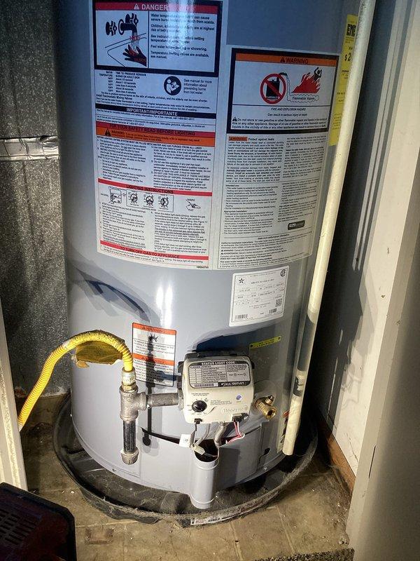 Completed prepaid plumbing maintenance inspection of residential water heating system. Thoroughly examined AO Smith ProLine Commercial Grade water heater installation, including all connections, safety components, and venting system. Inspected gas supply line, copper water supply lines with flexible corrugated sections, drain pan condition, and flue pipe assembly. Verified proper operation of temperature and pressure relief valve, gas control valve, and all warning labels for compliance. Documented system condition with photographs for maintenance records. Unit found to be in satisfactory operating condition with no immediate service needs identified.