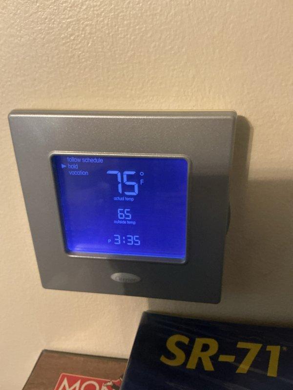Completed basic monthly cooling maintenance visit on residential HVAC system. Inspected thermostat operation showing proper temperature control at 75°F setpoint, verified outdoor condensing unit with clean coil fins and proper exterior condition. All components operating within normal parameters per routine preventative maintenance protocol.