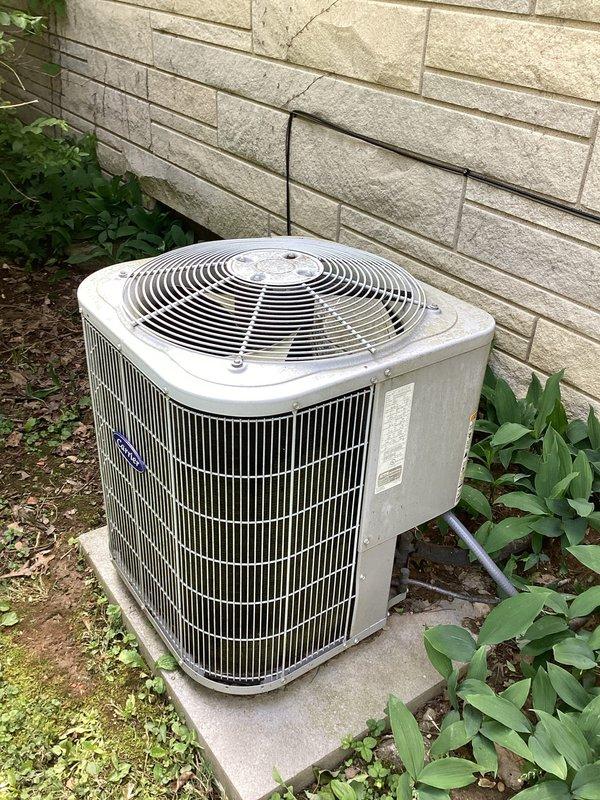 Responded to service call to diagnose issue with Carrier furnace system. Performed comprehensive inspection of indoor furnace unit located in basement and outdoor condenser unit. Evaluated system components including ductwork connections, copper refrigerant lines, electrical connections, and condensate drainage. Inspected outdoor condenser unit for proper operation, assessed condition of coils and fan assembly, and verified refrigerant line integrity between indoor and outdoor components. System evaluation completed and findings documented with photographic evidence for customer records.