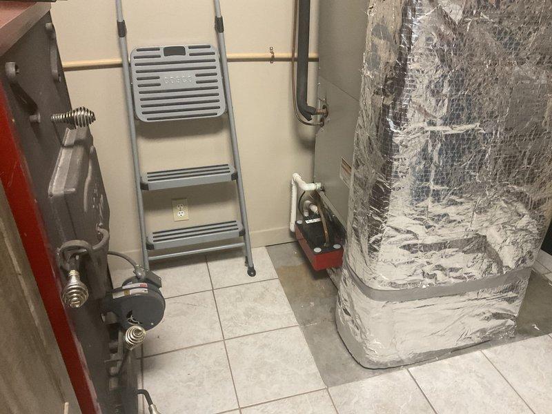 Completed comprehensive estimate for HVAC system replacement, transitioning from existing wood/electric heating system to new two-stage gas furnace and air conditioning unit. Assessed mechanical room layout, existing ductwork configuration, and utility connections including gas line requirements, electrical service modifications, and proper venting pathways for new gas appliance installation. Documented current equipment placement, clearance requirements, and recommended installation specifications for dual-fuel system upgrade to improve heating efficiency and add central cooling capability.