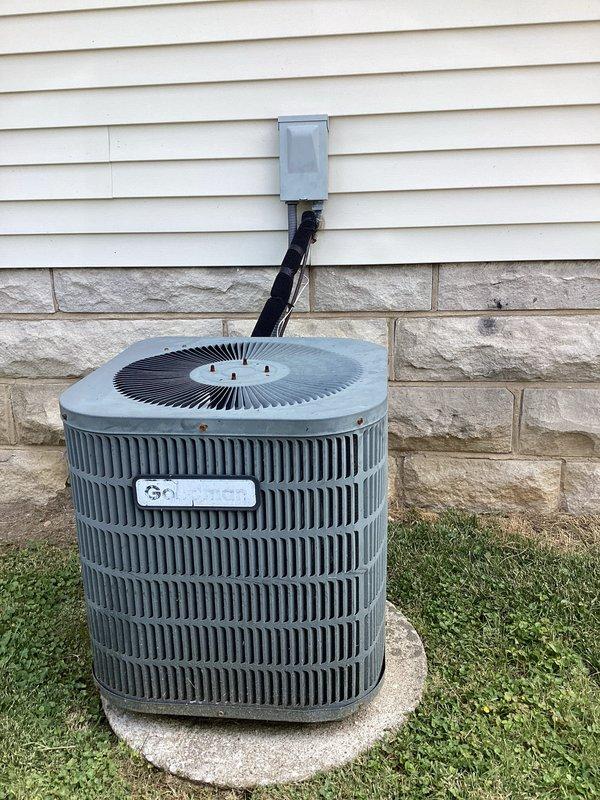 Completed basic monthly cooling maintenance visit on residential HVAC system. Inspected indoor air handler unit and outdoor condenser unit, replaced 16x25x1 air filter, verified electrical connections at junction box, and confirmed proper system operation. All components found in functional condition with normal wear consistent with system age.