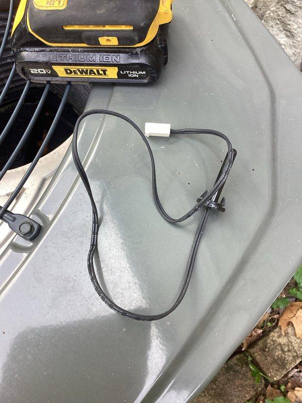 Returned to site with correct ambient temperature sensor after incorrect part was ordered previously. Replaced faulty sensor on outdoor heat pump unit and verified proper operation of system controls.