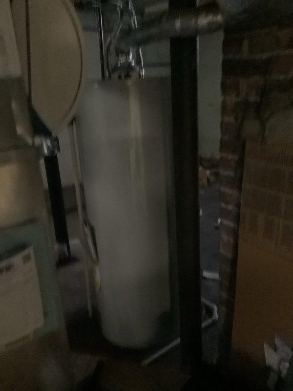Completed basic monthly cooling maintenance on residential Carrier HVAC system located in basement utility area. Performed standard inspection of air handler unit and furnace assembly, checked refrigerant lines and ductwork connections, verified proper airflow through system components, and inspected condensate drainage. All equipment found operating within normal parameters with no issues identified requiring immediate attention.