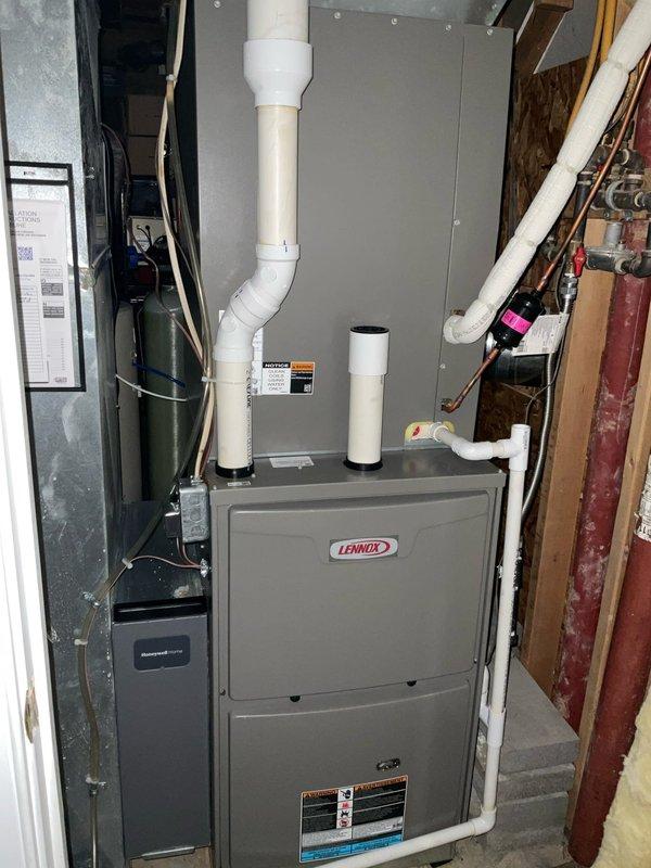 Conducted on-site assessment of residential HVAC system for comprehensive duct cleaning estimate. Evaluated Lennox furnace installation in basement mechanical room, documenting existing equipment configuration including PVC venting system, associated ductwork accessibility, and thermostat location. Photographed system components to provide detailed scope of work for complete air distribution system cleaning and sanitization service.