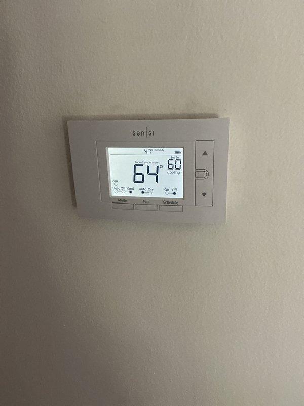 Completed routine cooling maintenance on vertical HVAC unit. Installed new 20x20x1 Filtrete filter, verified Sensi programmable thermostat operation showing 64°F ambient with 60°F cooling setpoint. Unit marked for follow-up inspection in 15 days coordinating with scheduled duct cleaning service.