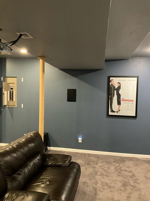 Conducted comprehensive basement HVAC assessment for potential return air vent installation in finished entertainment space. Evaluated existing ductwork infrastructure and system capacity to determine feasibility of adding supplemental vents to improve air circulation. Marked proposed location for new return air vent on basement wall and provided recommendations for Type-B double-walled flue pipe replacement and air duct cleaning services.