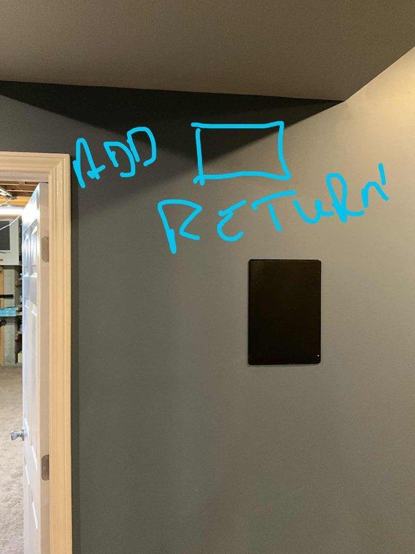 Conducted comprehensive basement HVAC assessment for potential return air vent installation in finished entertainment space. Evaluated existing ductwork infrastructure and system capacity to determine feasibility of adding supplemental vents to improve air circulation. Marked proposed location for new return air vent on basement wall and provided recommendations for Type-B double-walled flue pipe replacement and air duct cleaning services.