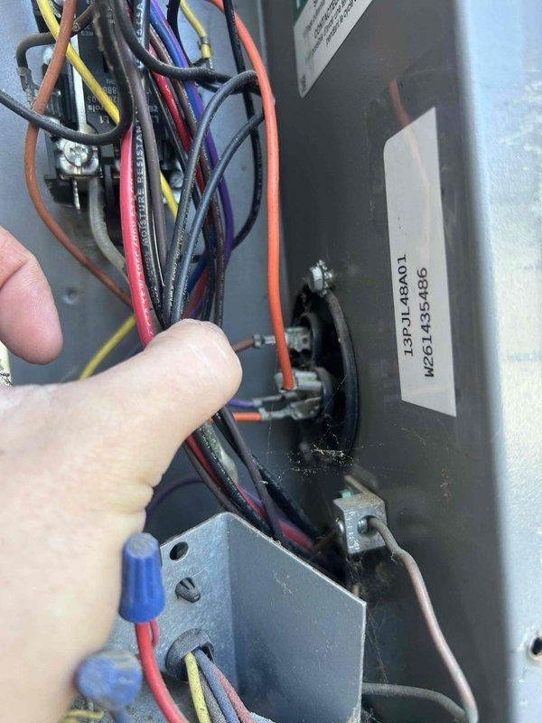 Responded to service call for AC unit failing to maintain desired temperature, with indoor temperature reaching 78°F despite thermostat set to 70°F. Performed diagnostic inspection of electrical control panel and wiring connections on Goodman unit model 13UA4801. Inspected and tested all wire terminations, including multi-colored control wiring and wire nut connections within junction box. System was unable to reach setpoint, only cooling to 73°F during previous operation.