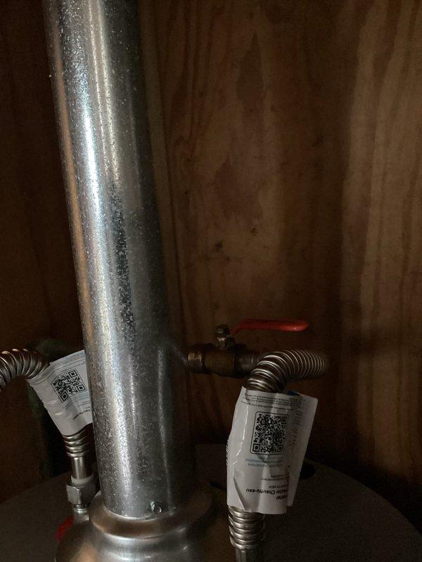 Replaced existing 40-gallon residential gas water heater with new unit. Disconnected and removed old water heater, including gas supply line, cold water inlet, and hot water outlet connections. Installed new 40-gallon gas water heater in same location, reconnecting all water supply lines using flexible corrugated stainless steel connectors. Attached gas supply line with proper fittings and verified all connections for leaks. Installed temperature and pressure relief valve with appropriate discharge piping. Connected flue vent pipe to ensure proper exhaust ventilation. Configured gas control valve settings and verified proper pilot light ignition and burner operation. Tested all plumbing connections for leaks and confirmed hot water delivery to fixtures throughout the home. System is operating within manufacturer specifications.