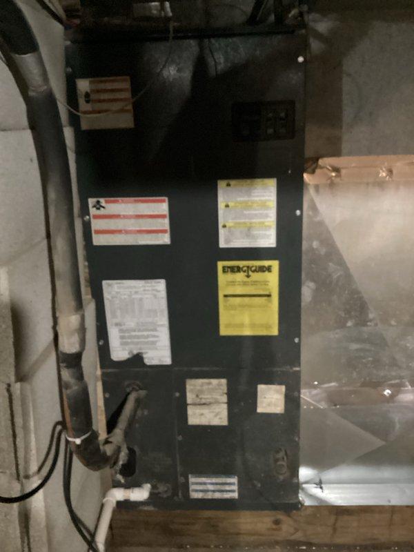Responded to service call for non-operational air conditioning system under home warranty contract. Upon arrival, performed diagnostic inspection of outdoor condenser unit and indoor air handler. System evaluation completed with photographic documentation of equipment condition and installation configuration for warranty processing purposes.