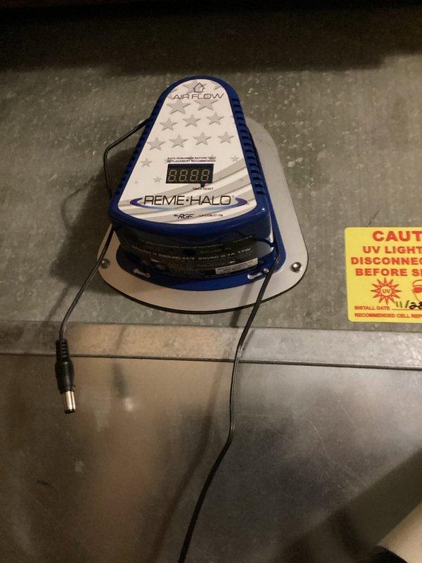 Returned to property to replace defective REME HALO air purification system under manufacturer warranty. Removed failed unit from HVAC ductwork and installed new REME HALO replacement unit obtained from Johnstone Supply. Verified proper electrical connection, confirmed digital display operational reading, and ensured correct airflow orientation within the duct system. Unit tested and functioning as designed.