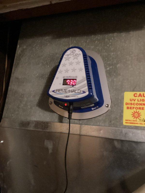 Returned to property to replace defective REME HALO air purification system under manufacturer warranty. Removed failed unit from HVAC ductwork and installed new REME HALO replacement unit obtained from Johnstone Supply. Verified proper electrical connection, confirmed digital display operational reading, and ensured correct airflow orientation within the duct system. Unit tested and functioning as designed.