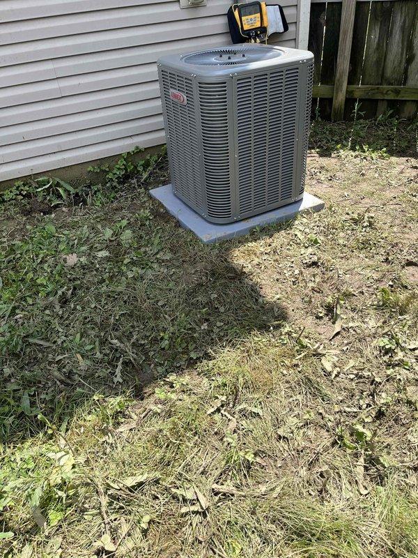 Completed full installation of Lennox air conditioning system and evaporator coil at residential property. New outdoor condensing unit was positioned on concrete pad alongside exterior wall with proper clearances maintained, and indoor evaporator coil was installed in conjunction with existing Lennox furnace in utility room. All refrigerant lines, electrical connections, condensate drainage, and ductwork transitions were properly completed, system was charged to manufacturer specifications, and unit was tested to verify proper operation and cooling performance.