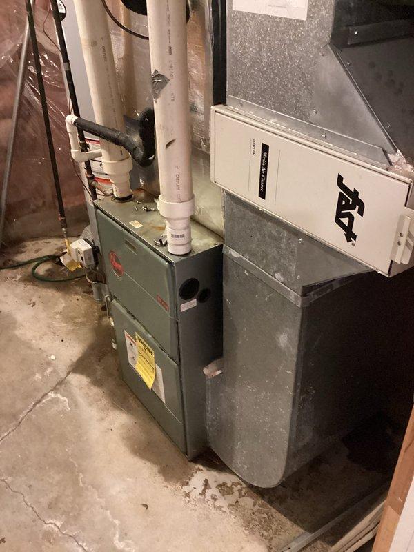 Responded to no cooling complaint on residential air conditioning system. Performed diagnostic evaluation of Rheem high-efficiency outdoor condensing unit and indoor air handler with furnace. Inspected refrigerant levels, electrical connections, and airflow components. Provided duct cleaning estimate as requested and discussed system performance expectations for current cooling season.