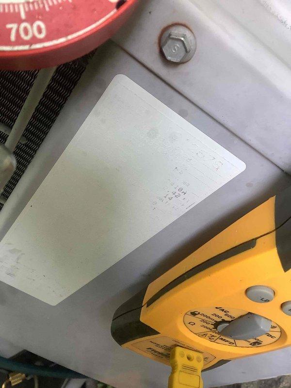 Responded to intermittent A/C operation complaint. Inspected outdoor unit and electrical disconnect, finding cartridge fuses and electrical connections at exterior disconnect box. Performed diagnostic testing with multimeter to verify electrical supply and component operation, documenting equipment nameplate data and measuring system parameters to identify cause of intermittent cycling issue.