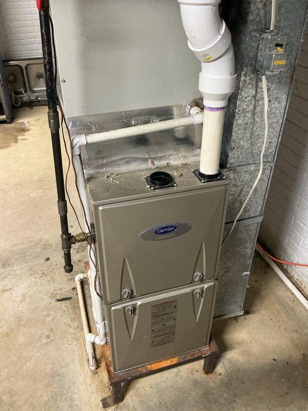 Completed cooling maintenance inspection on Carrier furnace system with integrated cooling capabilities. Performed standard preventive maintenance procedures including system evaluation, verified thermostat operation showing 69°F setpoint on Ecobee digital control, and assessed overall equipment condition. Filter type could not be determined at time of service and will require follow-up identification for future maintenance scheduling.