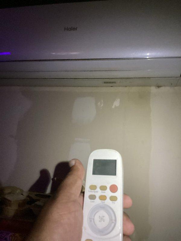 Performed monthly preventive maintenance on two mini-split air conditioning systems. Inspected interior components of wall-mounted Haier unit, noting dust accumulation on evaporator coil assembly and blower compartment requiring cleaning attention. Verified condensate drain line operation and tested system functionality using manufacturer remote control to ensure proper cooling performance and operational settings.