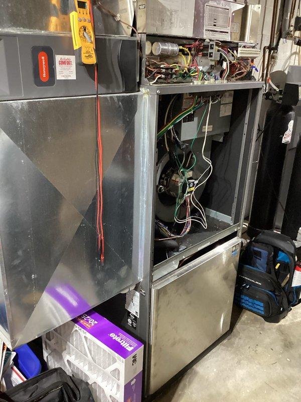 Responded to no cooling call on geothermal system. Upon arrival, found thermostat displaying "Call For Service" message with indoor temperature at 78°F and setpoint at 68°F. Inspected geothermal heat pump unit and internal components including blower motor, wiring connections, and refrigerant lines. Performed diagnostic testing to identify system fault causing cooling failure and restored system to proper operation.