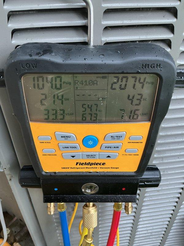 Completed cooling maintenance service under CCHP agreement. Performed system diagnostics using refrigerant manifold gauges, verified R410A refrigerant pressures and temperatures within normal operating parameters. Inspected thermostat operation showing current temperature at 76°F with setpoint of 75°F in cooling mode. System operating properly with adequate airflow through return grille. Note: 16x20x4 filter replacement not included in this service visit.