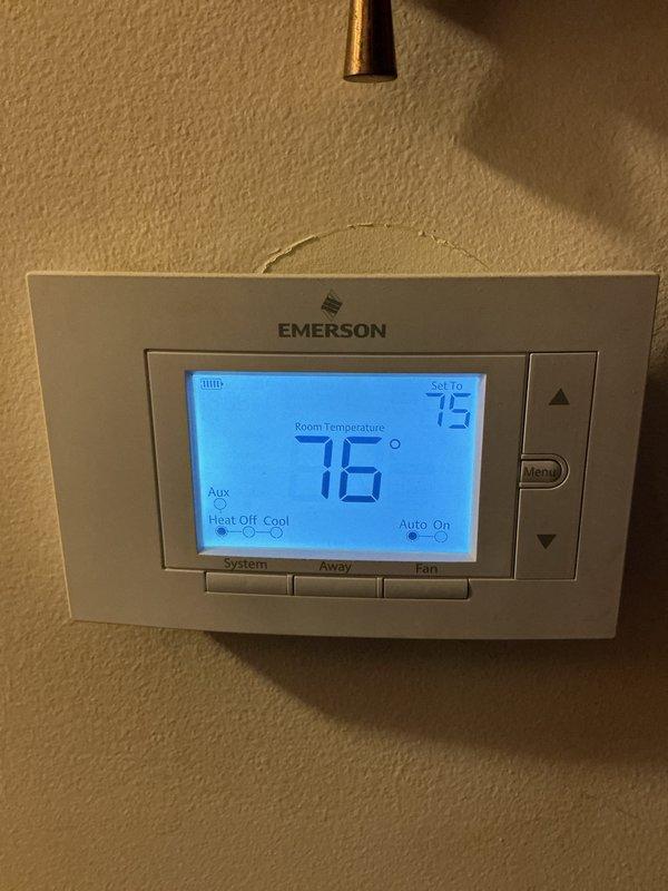 Completed cooling maintenance service under CCHP agreement. Performed system diagnostics using refrigerant manifold gauges, verified R410A refrigerant pressures and temperatures within normal operating parameters. Inspected thermostat operation showing current temperature at 76°F with setpoint of 75°F in cooling mode. System operating properly with adequate airflow through return grille. Note: 16x20x4 filter replacement not included in this service visit.