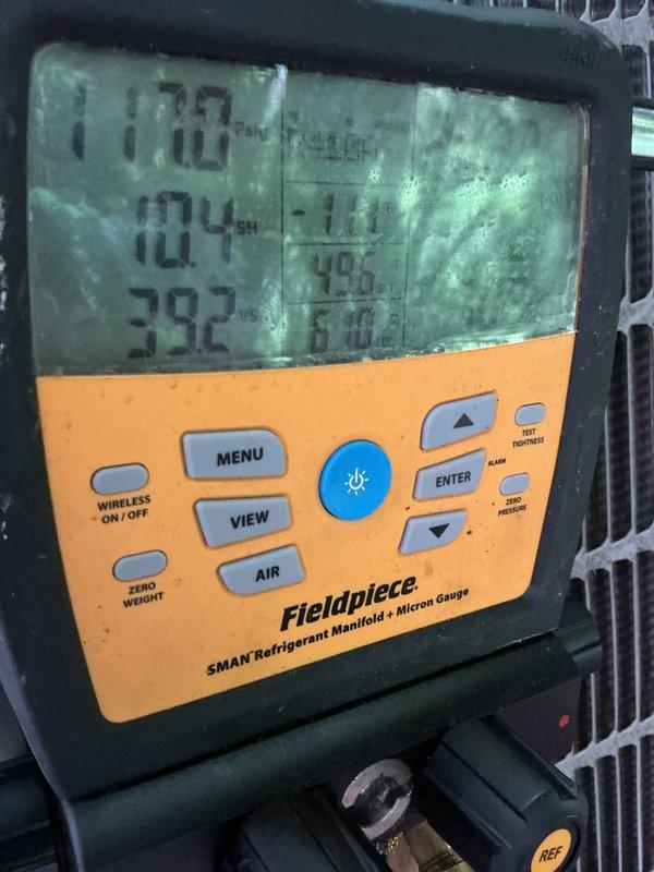 Performed comprehensive cooling maintenance on 10-year-old air conditioning system. Conducted complete system inspection and tune-up with no issues identified. Utilized refrigerant manifold and micron gauge to verify proper refrigerant pressures and system performance, confirming all parameters within manufacturer specifications for optimal operation.