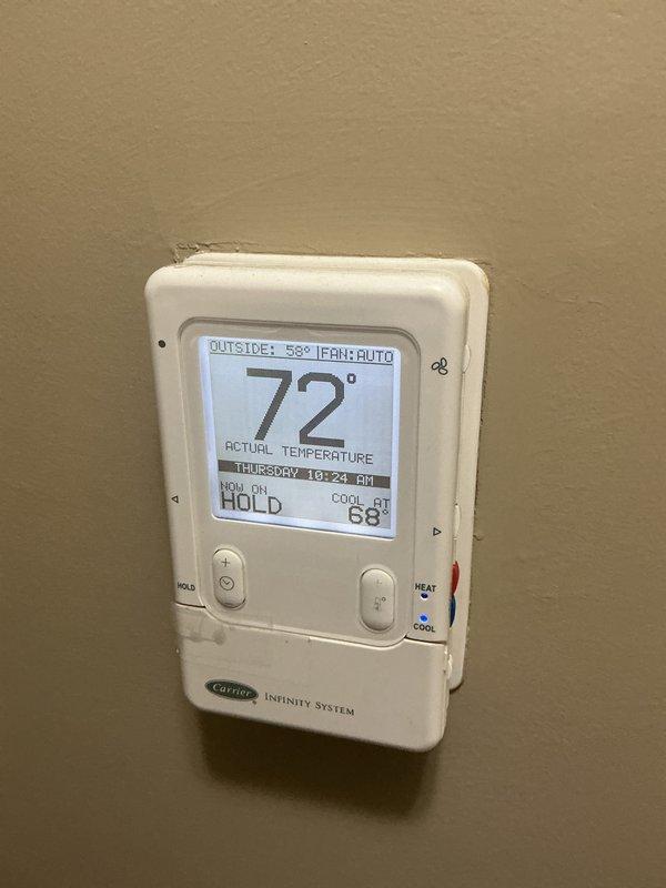 Completed cooling tune-up on Carrier Infinity System unit during scheduled maintenance appointment. Performed comprehensive system inspection, verified thermostat operation showing 72° actual temperature with cooling setpoint at 68°, and documented equipment condition with photos. All components found operating within normal parameters.