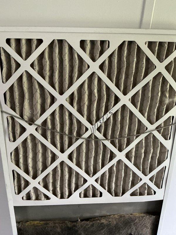Completed monthly cooling maintenance visit and addressed customer concern regarding unit running continuously during hot weather. Replaced heavily soiled 20x20x1 and 16x20x1 return air filters which showed significant dust and dirt accumulation that was likely restricting airflow and contributing to extended runtime. Performed standard cooling system inspection, verified thermostat operation showing 70°F setpoint in heat mode with fan set to auto, and confirmed system is now operating within normal parameters.