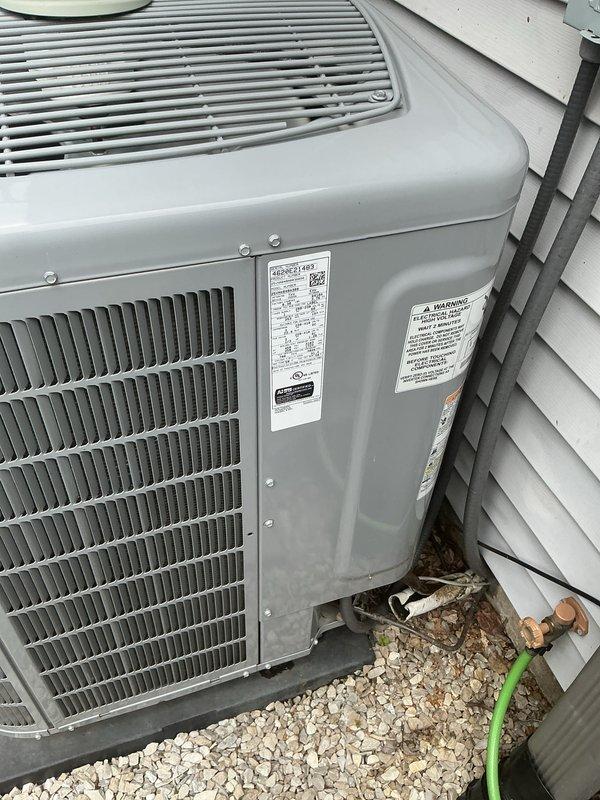 Completed annual spring tune-up on Carrier HVAC system. Homeowner reported error code over the weekend, but system was operating normally upon arrival with no active faults. Performed comprehensive inspection of indoor and outdoor units, verified thermostat operation at 69°F with cooling setpoint of 54°F, and confirmed proper system performance with adequate cooling capacity. Outdoor condenser unit showed no visible damage with clean coils and intact refrigerant lines. System operating within normal parameters with no issues found.