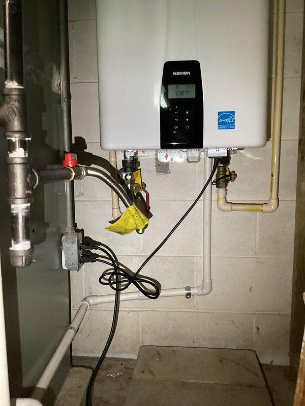 Completed comprehensive annual plumbing inspection of residential water heating systems, including traditional tank-style water heater and Navien tankless unit set at 120°F. All connections, valves, pressure relief components, and piping infrastructure were visually examined and found to be in proper working order with no leaks or safety concerns identified.