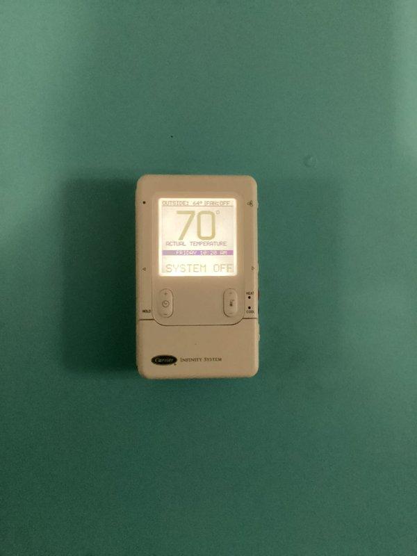 Completed seasonal cooling maintenance on dual-zone HVAC system with Carrier Infinity controls. Performed comprehensive inspection of both air handling units, replaced two 16x20x4 air filters, verified refrigerant levels and pressures, checked electrical connections and amp draws, cleaned condensate drains, and tested system operation. Confirmed Carrier Infinity thermostat programming and communication with equipment, verified desired comfort settings at 70°F with system in off mode. All equipment operating within manufacturer specifications, maintenance agreement renewed through 8/14/26.