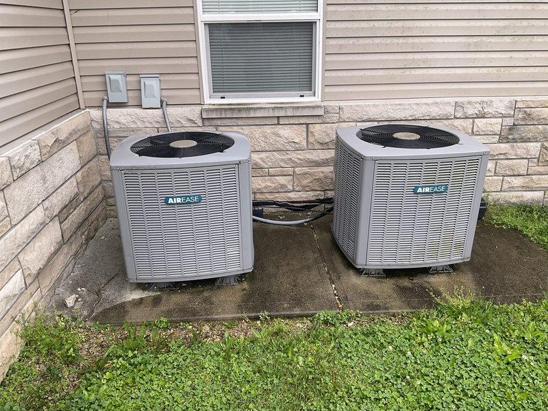 Completed full system replacement estimate for 2011 HVAC system experiencing chronic R-410A refrigerant loss requiring annual recharging. Assessed existing AirEase outdoor condenser units and indoor furnace system, documented equipment specifications and installation configuration, and provided comprehensive replacement options for both heating and cooling components to address ongoing refrigerant leak issues.