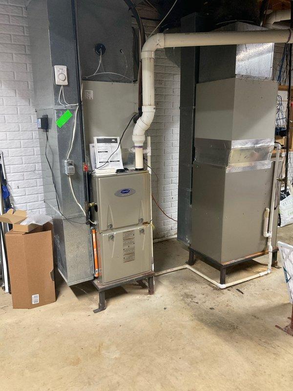 Conducted full system evaluation for two existing HVAC systems utilizing obsolete R-22 refrigerant. Assessed basement-mounted Carrier furnace with air handler and corresponding outdoor condenser units to provide comprehensive replacement estimate. Documented current equipment configuration, ductwork connections, electrical infrastructure, and refrigerant line routing to determine specifications for upgraded dual-system installation with modern refrigerant technology.