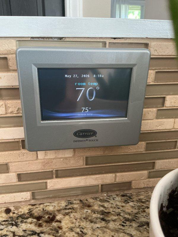 Completed basic monthly maintenance on Carrier Infinity cooling system. Performed standard preventive maintenance procedures including inspection of all major components, verified thermostat operation and system controls, and documented equipment condition with photos. Customer advised that 16x25x4 air filter is not included in maintenance agreement.