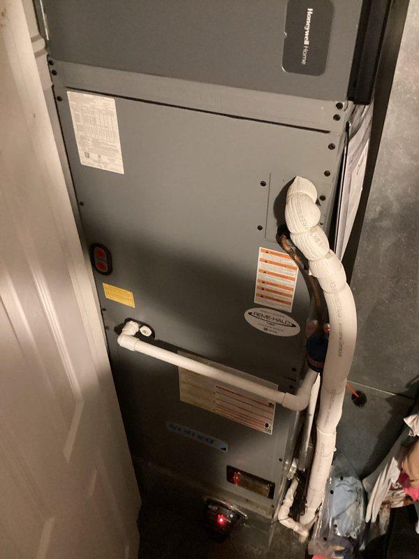 Completed monthly maintenance visit for cooling system under membership agreement. Performed standard preventive maintenance procedures on vertical air handler unit, replaced 20x20x4 air filter, and verified proper operation of Daikin smart thermostat displaying 70°F setpoint with 65% humidity reading. All refrigerant lines, safety labels, and system components inspected and found in good working order.