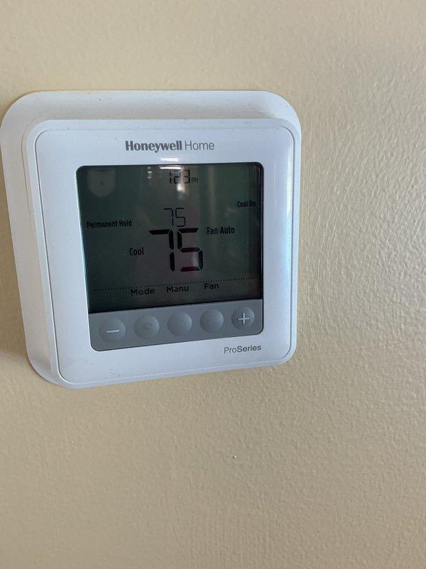 Completed basic monthly cooling maintenance on residential HVAC system. Inspected outdoor unit and verified proper operation of Honeywell Home ProSeries thermostat, which was functioning correctly in cooling mode with fan set to auto at 75 degrees. Filter size could not be determined during this visit and will require follow-up for proper replacement specification.