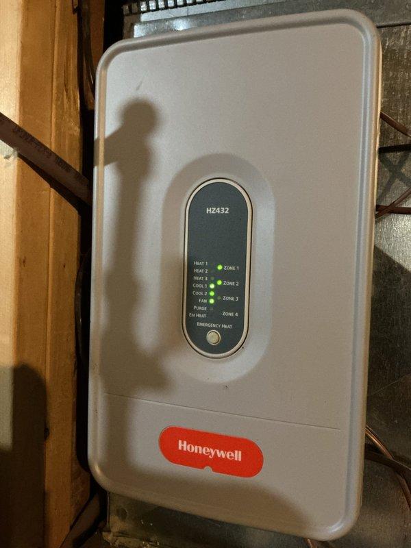 Responded to no airflow complaint on upper floor of two-story residence. Inspected Honeywell HZ432 four-zone control panel and THM5320R zone thermostat. Found Zone 2 damper actuator had failed in closed position, preventing airflow to upper level while ground floor zones remained operational. Replaced faulty damper actuator, verified proper zone operation through system cycle test, and confirmed all four zones now responding correctly to thermostat calls with appropriate airflow distribution throughout home.