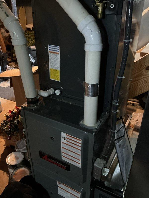 Completed basic monthly cooling maintenance on residential HVAC system. Inspected furnace unit with refrigerant lines and PVC venting, verified Honeywell Home thermostat operation showing 72°F cooling setpoint with proper system response. System operating within normal parameters; customer advised that 20x25x4 filter not included in maintenance agreement.